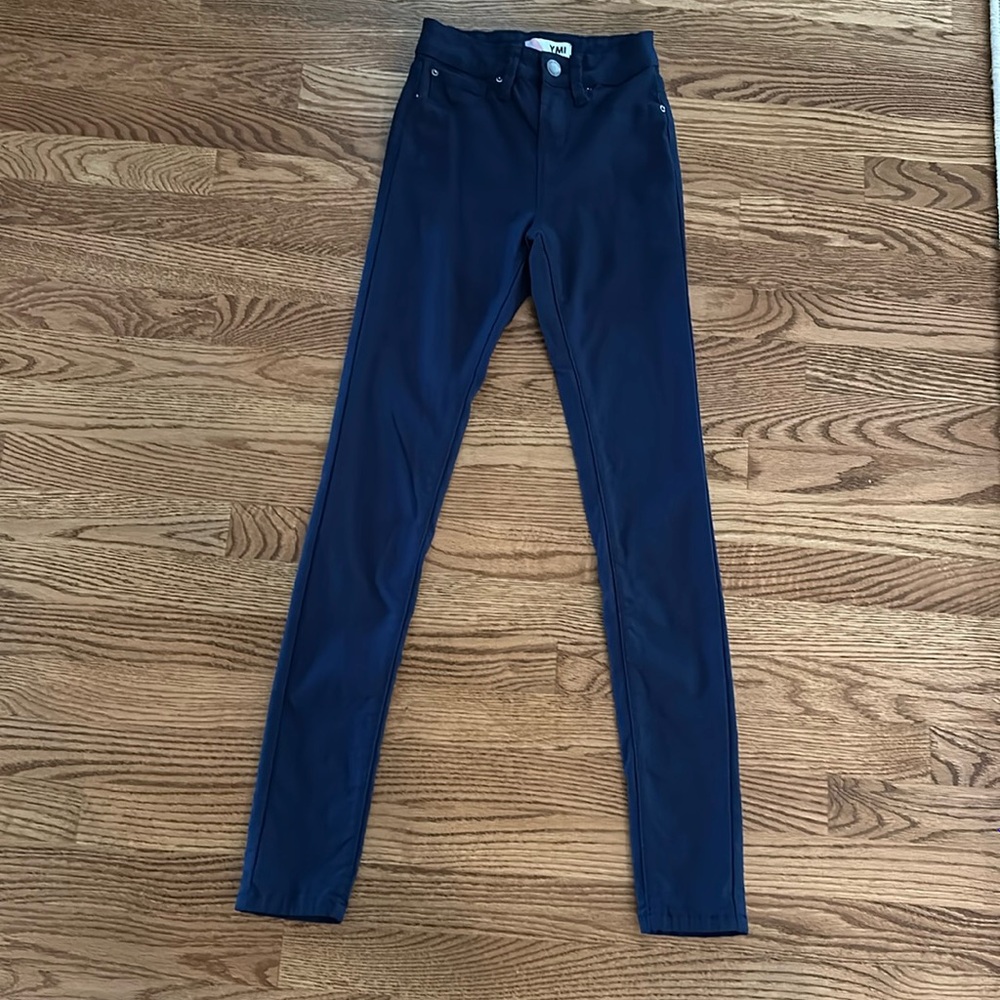 Navy blue tight fitting pants with back pockets (front pockets are fake)